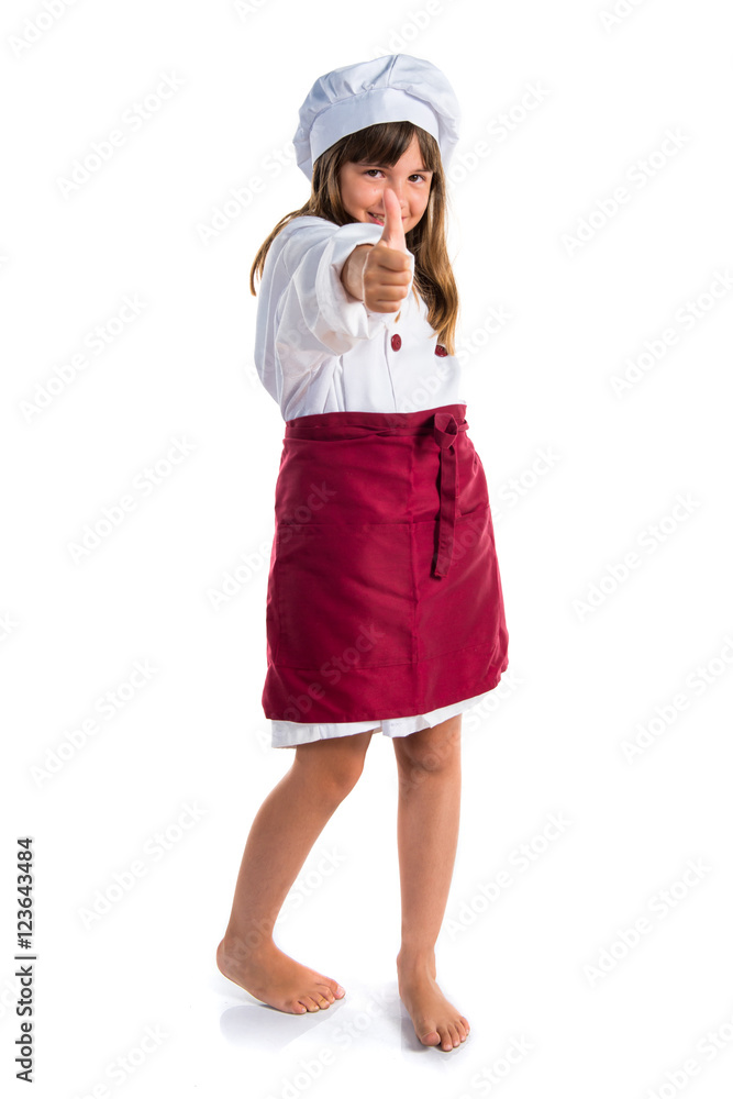 Little cute girl dressed like a chef with thumb up Little cute girl dressed like a chef with thumb up