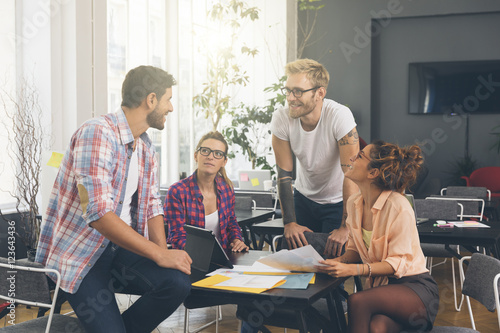 Young business people working at office on new project