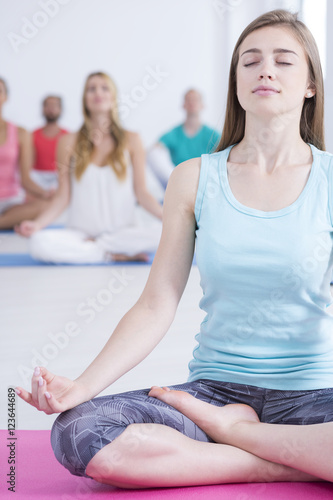 Woman with closed eyes during the meditation