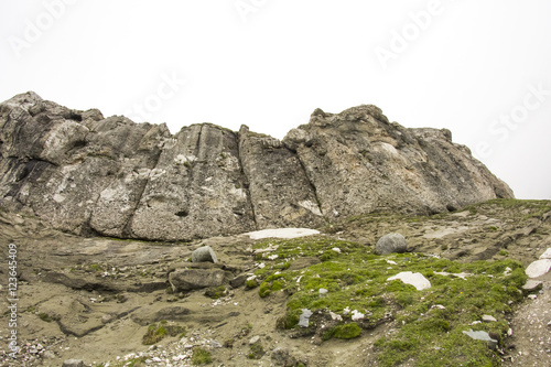 Landscape from Bucegi Mountains, part of Southern Carpathians in Romania in a very foggy day