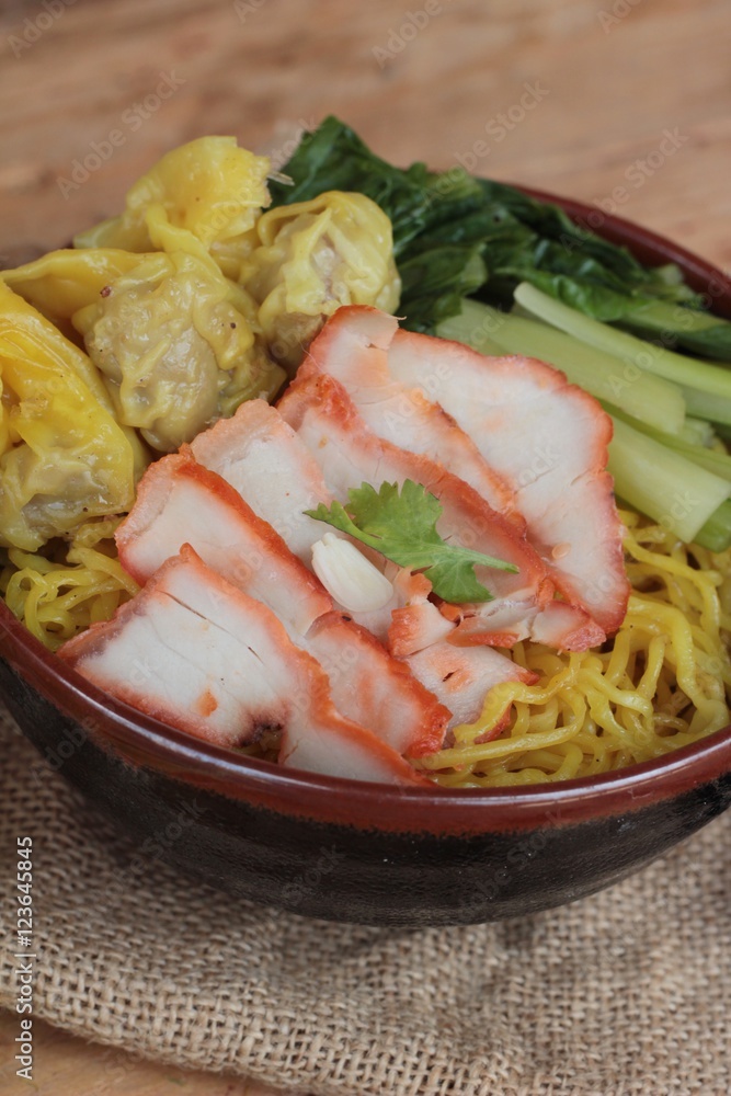 Egg noodles with pork and dumpling is delicious. Egg noodles with pork and dumpling is delicious.