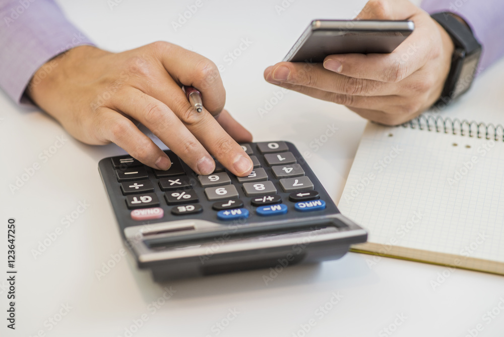 Man doing his accounting, financial adviser working Man doing his accounting, financial adviser working