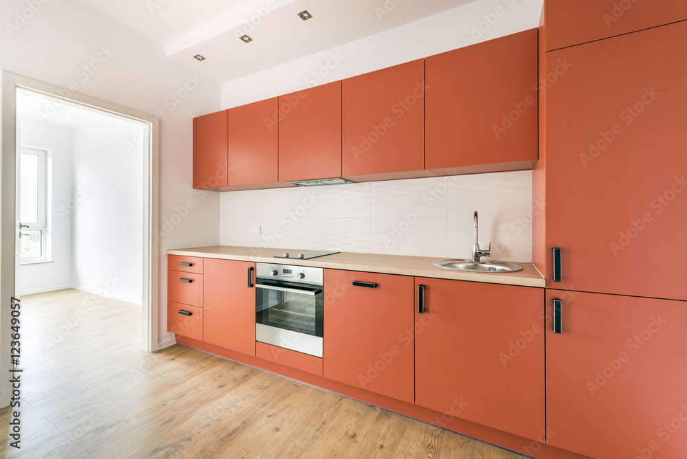 Empty room with domestic kitchen Empty room with domestic kitchen