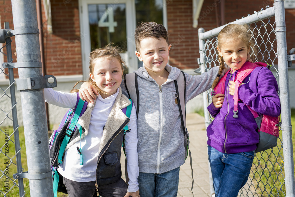 Obraz premium students outside school standing together