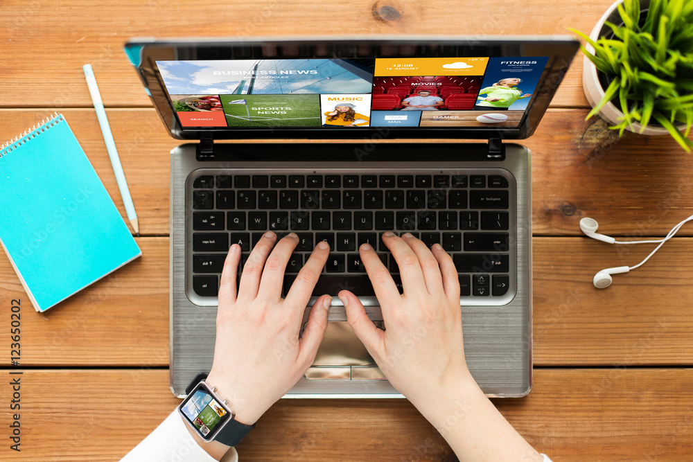 Fototapeta premium close up of woman or student typing on laptop