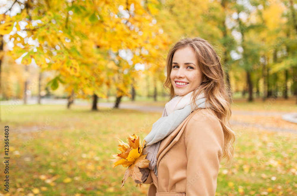 beautiful woman with maple leaves in autumn park beautiful woman with maple leaves in autumn park