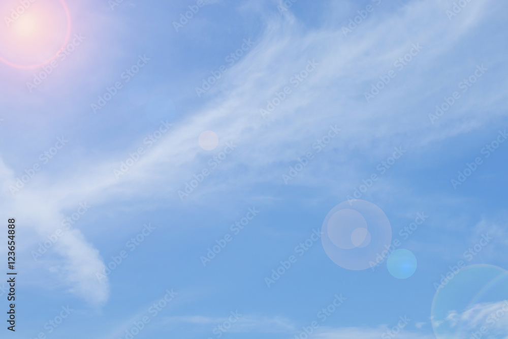 Blue sky background with cloud with lens flare Blue sky background with cloud with lens flare