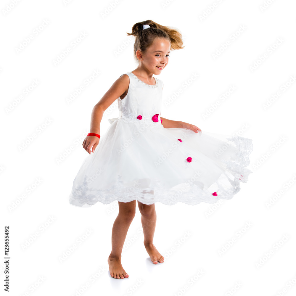 Naklejka premium Little girl dressed as a princess dancing