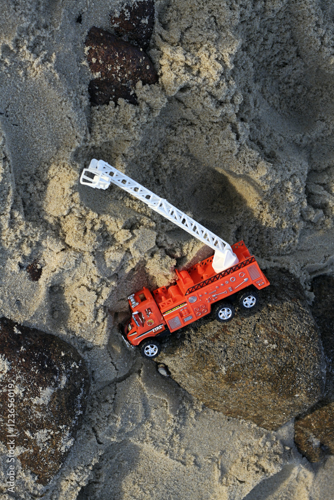 fire truck in the sand of a beach fire truck in the sand of a beach