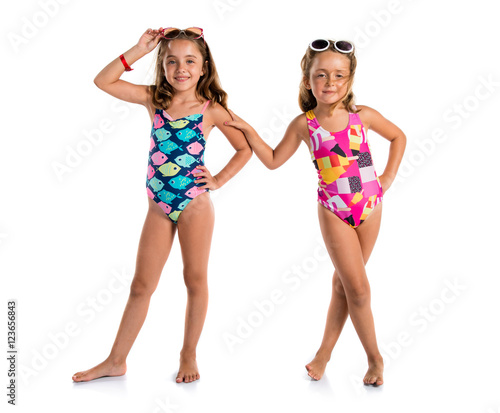 Little cute girls in swimwear