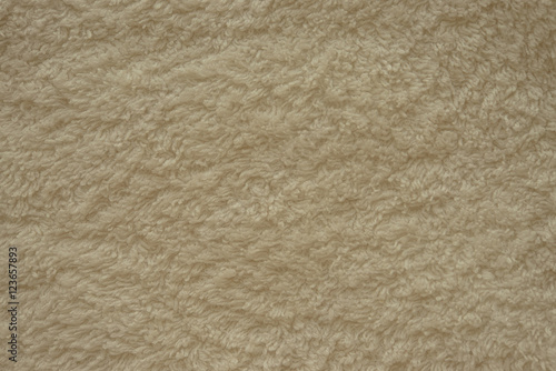 Бежевое махровое полотенце текстура. Натуральная хлопковая махровая ткань