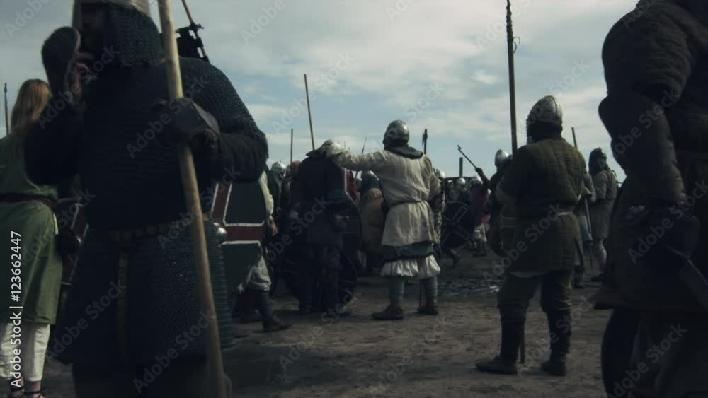 Walking in Crowd of Medieval Warriors during Rest Between Battles. Medieval Reenactment.