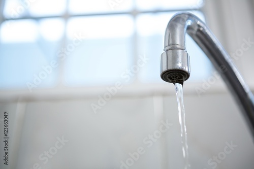 Close-up of water flowing from a tap