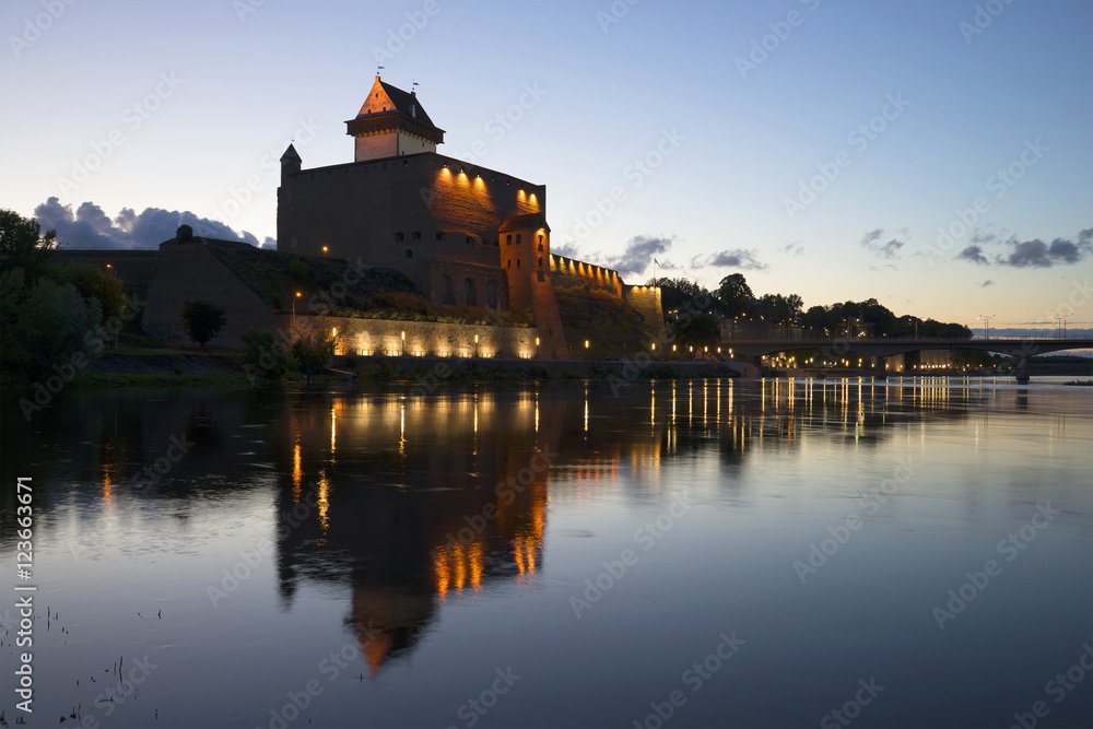 Herman's castle and the waterfront on a summer night. Narva, Estonia