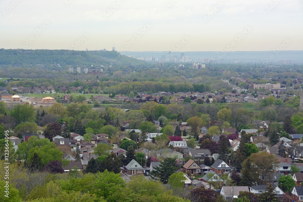 view from the Devils Punch bowl lookout point towards the Stoney Creek community and Hamilton in the far background, Ontario Canada view from the Devils Punch bowl lookout point towards the Stoney Creek community and Hamilton in the far background, Ontario Canada