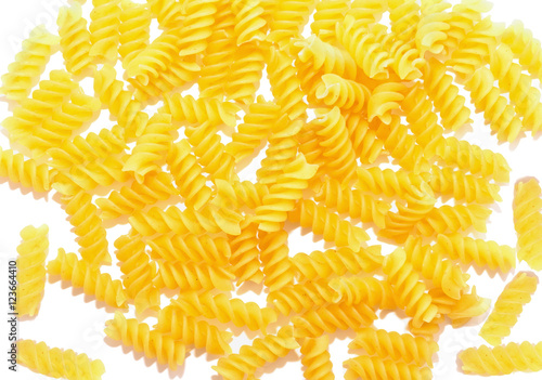 Dry spiral pasta fusilli, isolated on white background
