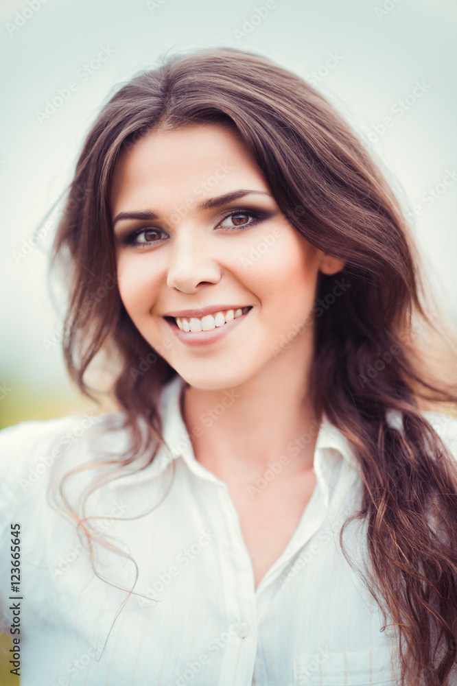 Closeup portrait of happy smiling beautiful young woman Closeup portrait of happy smiling beautiful young woman