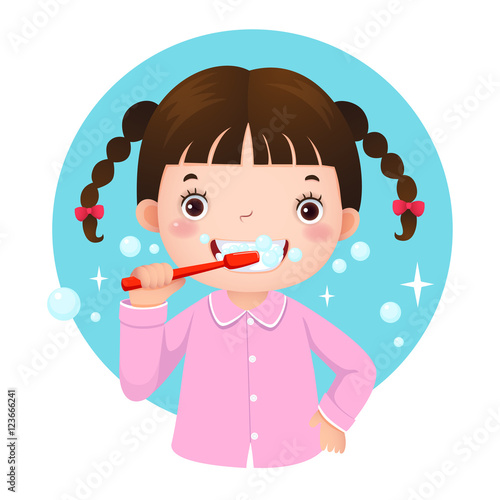 Cute girl brushing her teeth