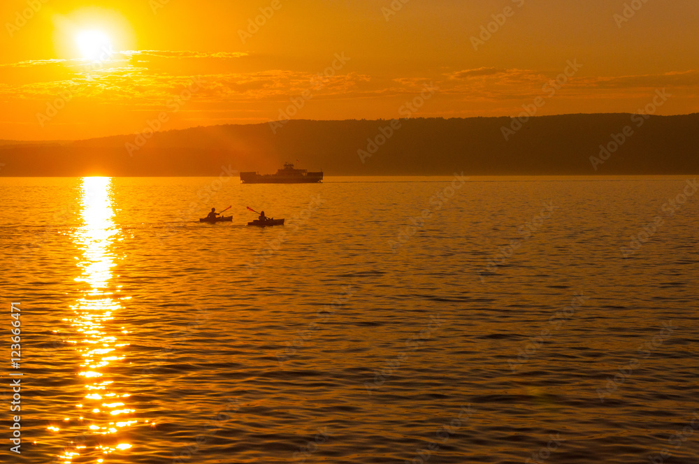 Kayakers and Ferry on Lake Superior at Sunset