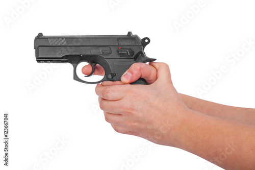 Hand holding a gun isolated on white background 