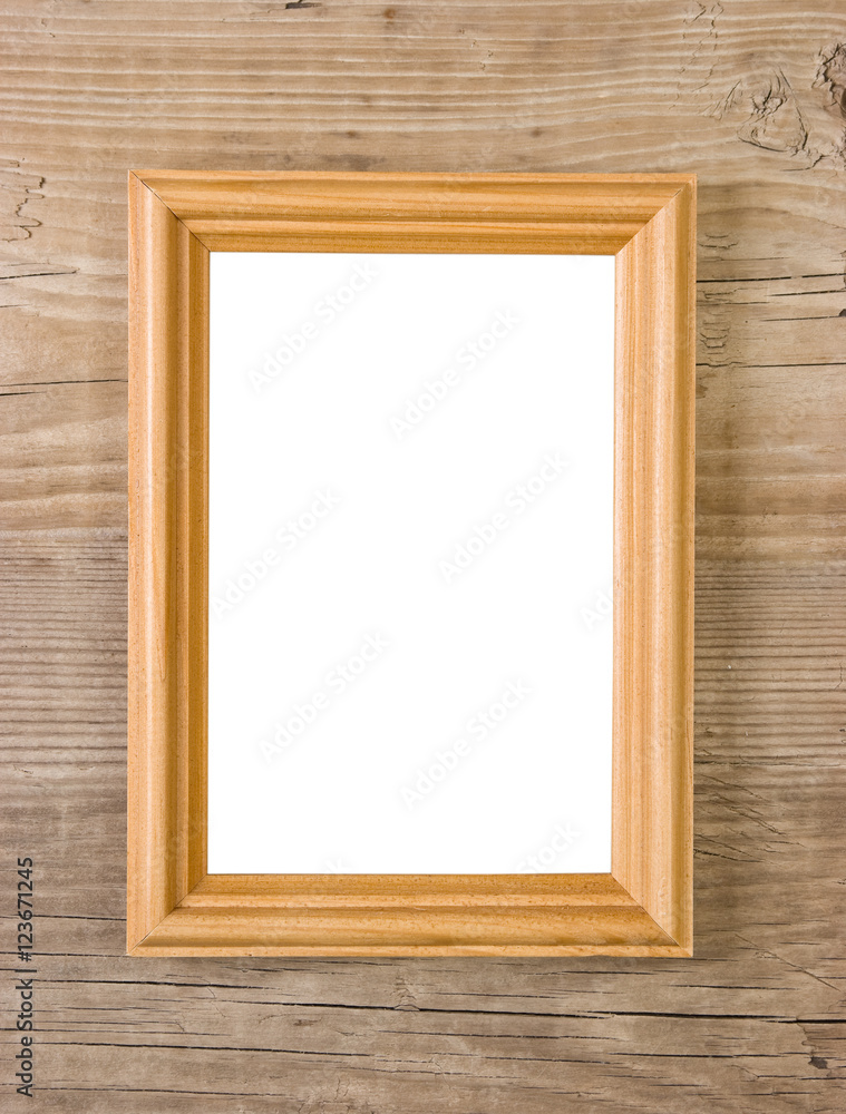 old picture frame on a wooden background old picture frame on a wooden background
