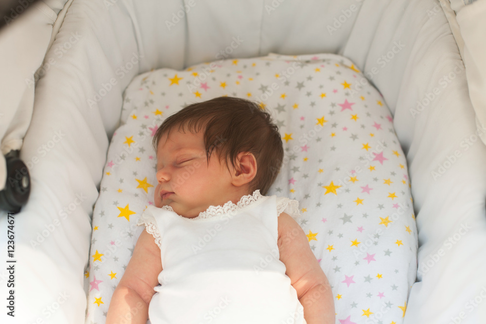 Baby sleeping in the pram
