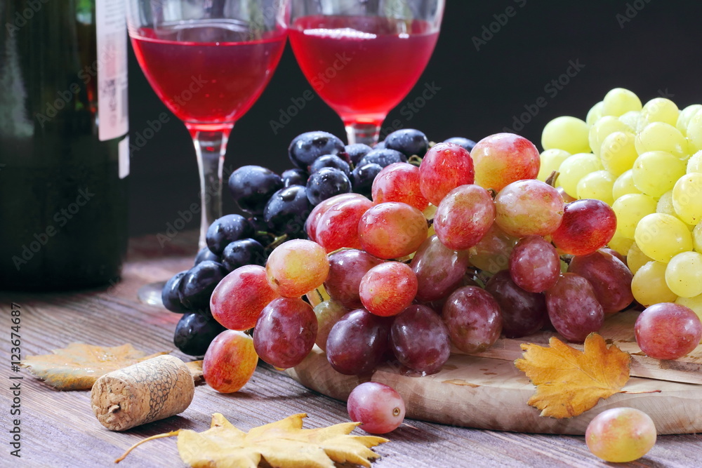 Sweet grape of different kinds and red wine Sweet grape of different kinds and red wine