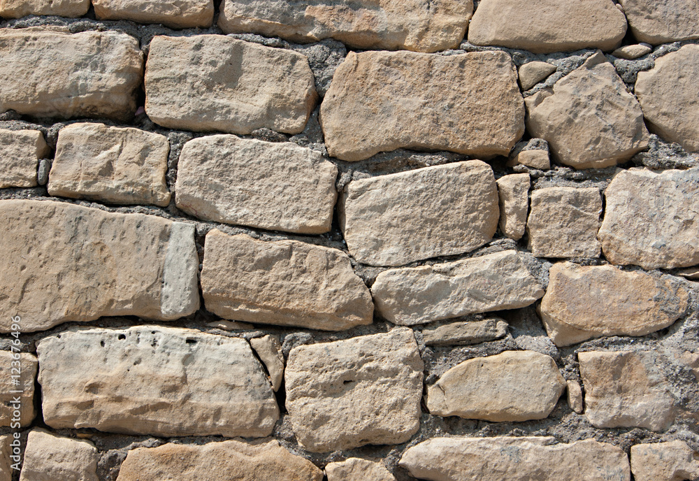 stone wall of large stones stone wall of large stones