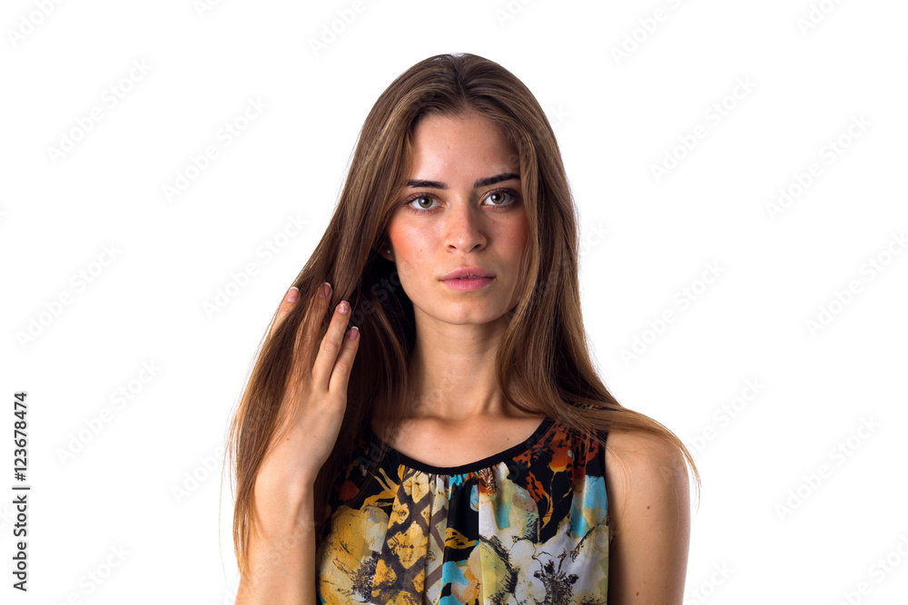 Woman touching her hair Woman touching her hair