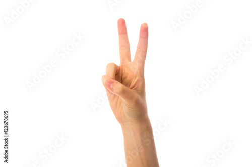 Woman's hand showing peace