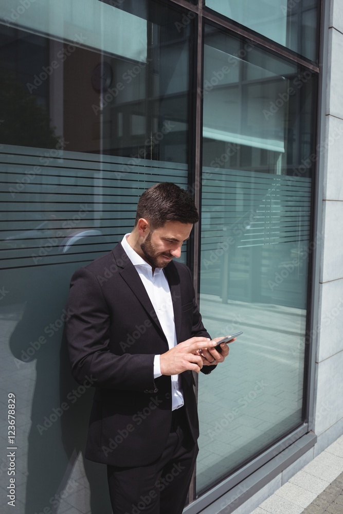 Businessman using mobile phone Businessman using mobile phone