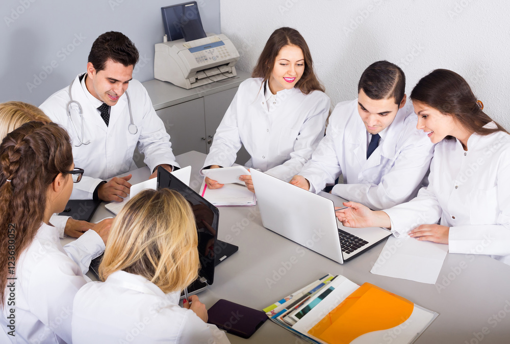 Fototapeta premium Health-care workers and head physician at colloquium in clinic