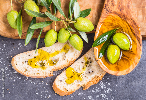 Olive oil, olives and bread.Tasting olive oil.