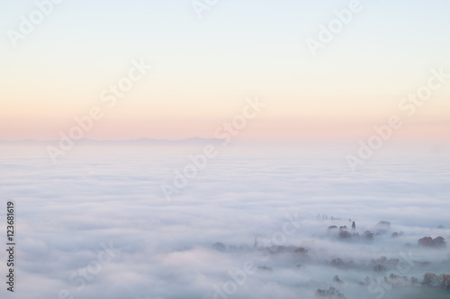 Fog covers the Vale of Gloucester during early evening. © Ross