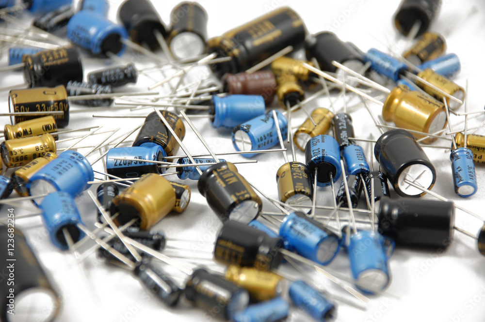 Lots of capacitors on white background wallpaper Lots of capacitors on white background wallpaper
