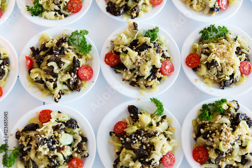 Many plates of vegetable salad