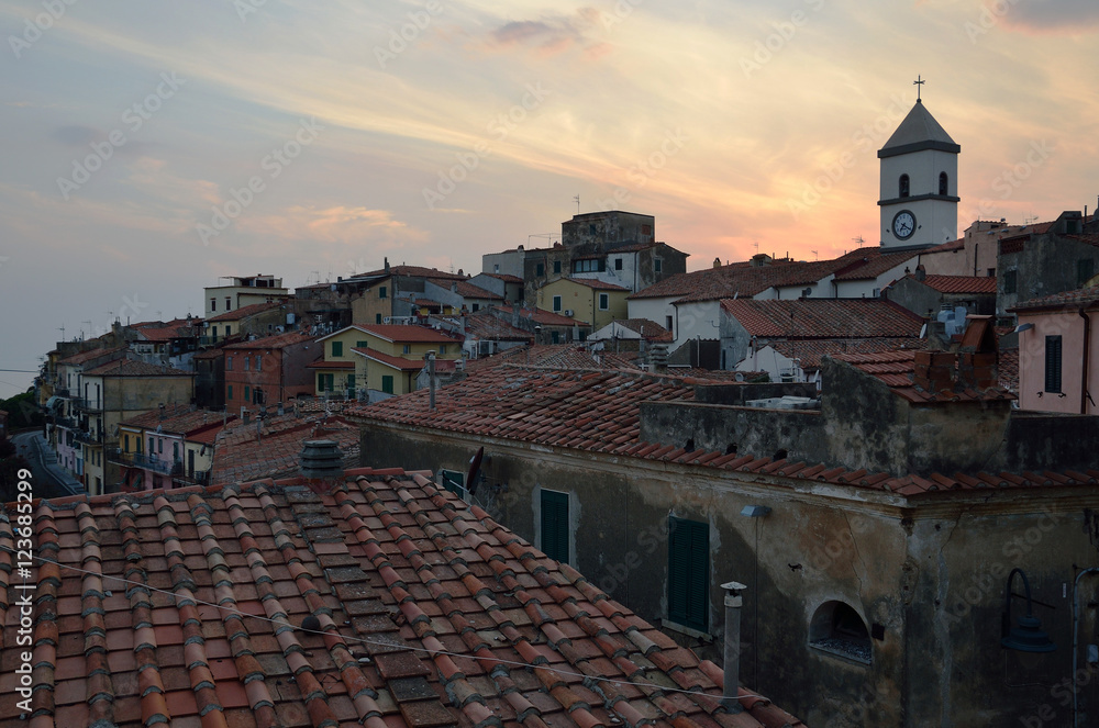 Panoramic view over the medieval city Capolivery in evening, Elba island, Tuscany, Italy, Europe.