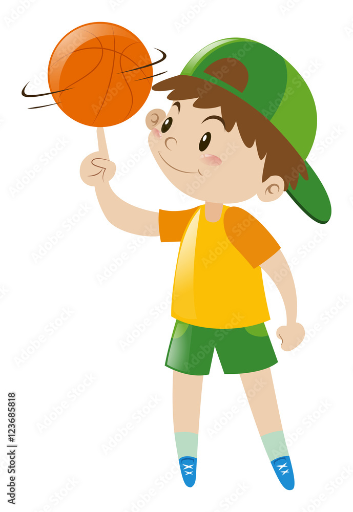 Boy spinning basketball on finger