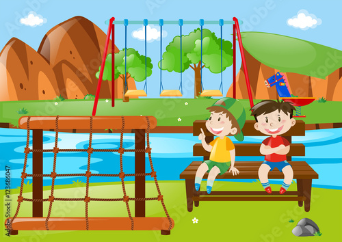 Two boys sitting in the park