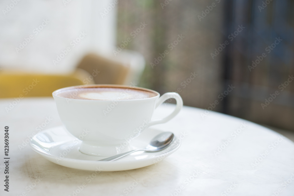 Laptop and coffee cup on wooden table Laptop and coffee cup on wooden table
