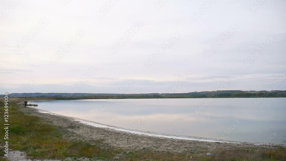 man athlete runs runner sport on nature near a lake healthy lifestyle man athlete runs runner sport on nature near a lake healthy lifestyle