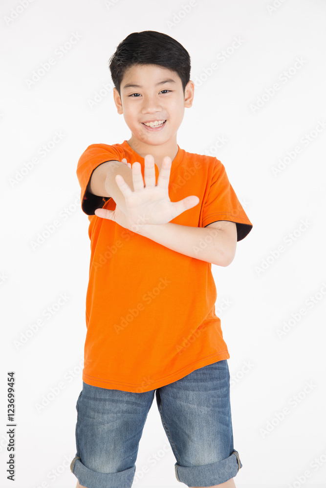 Photo of adorable young happy asian boy looking at camera Photo of adorable young happy asian boy looking at camera
