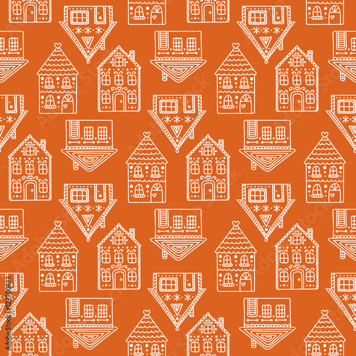 Gingerbread houses. Seamless pattern with gingerbread house. Cute christmas background. Brown colors.