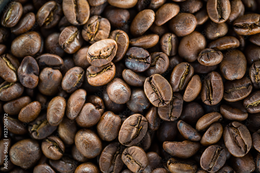 Coffee beans with interesting light. Background image Coffee beans with interesting light. Background image