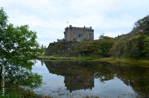 Reflections of Dunvegan Castle in Scotland photo