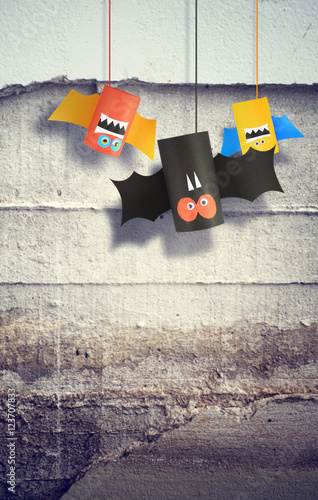 Halloween bats family for Halloween concept background. Paper crafts / DIY.