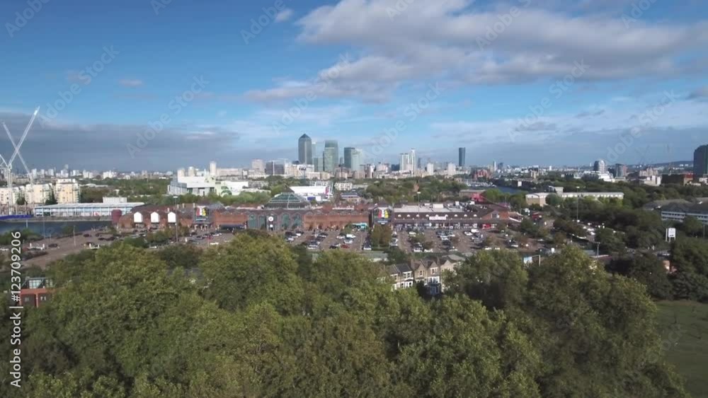 Aerial push in view of the financial district of the Docklands in London Aerial push in view of the financial district of the Docklands in London