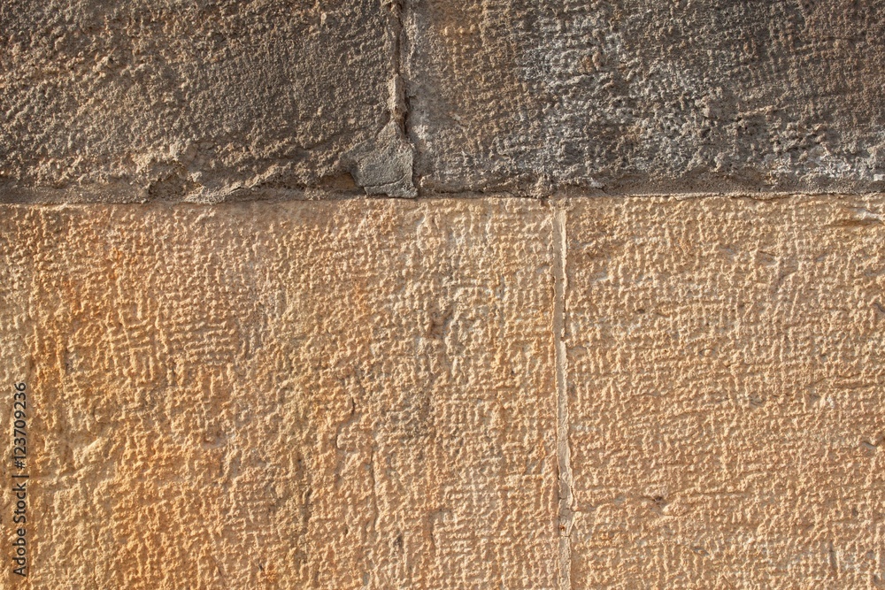 Fototapeta premium Historical wall of sandstone. Details of sand stone texture 