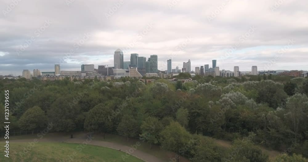Aerial ascending revealing view of the financial district of the Docklands in London Aerial ascending revealing view of the financial district of the Docklands in London