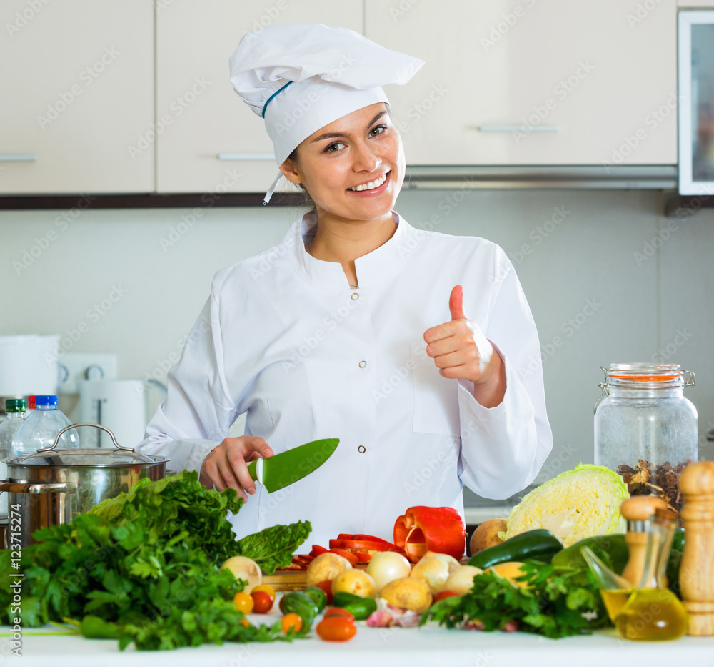 Portrait of professional chef with vegetables foto de Stock Adobe Stock